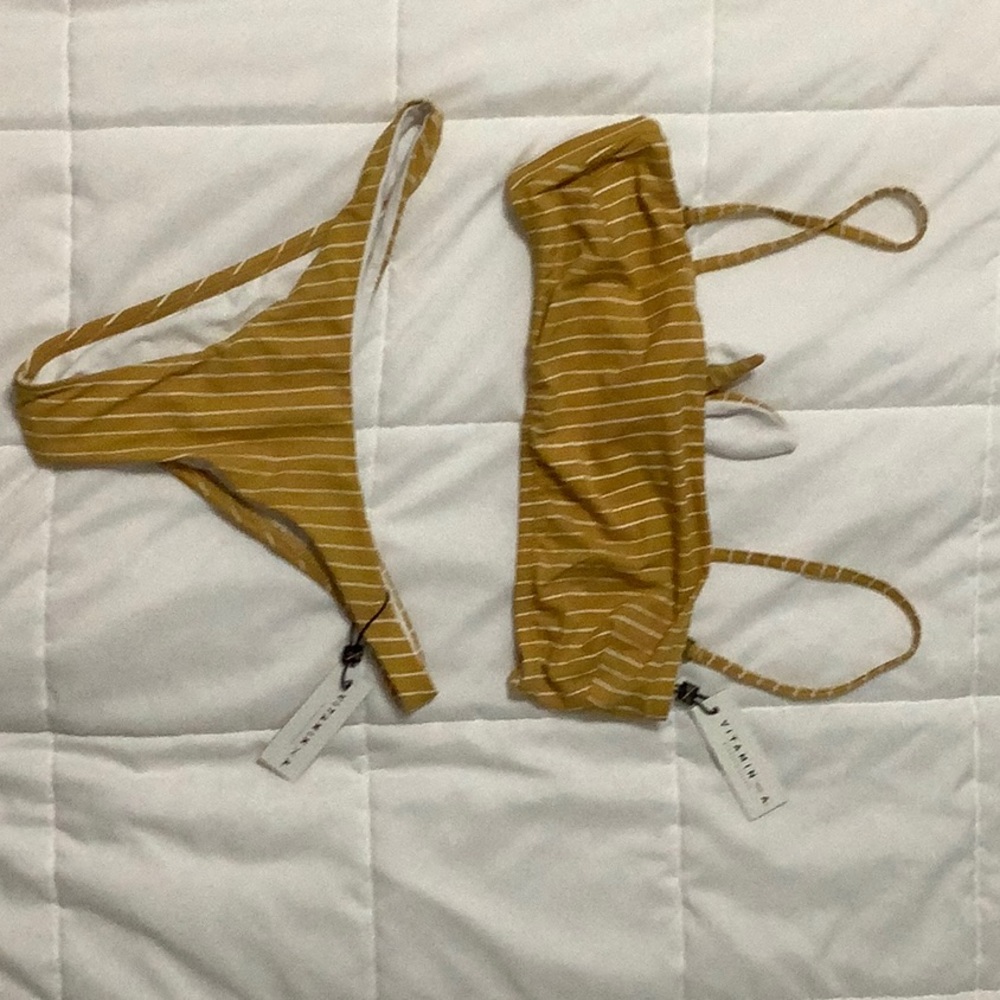 NWT Vitamin A Swimwear Small cheeky cut bottoms and a medium top.